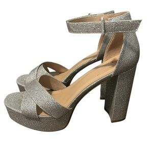 Delicious Sandrea Silver Glitter Platform Heels